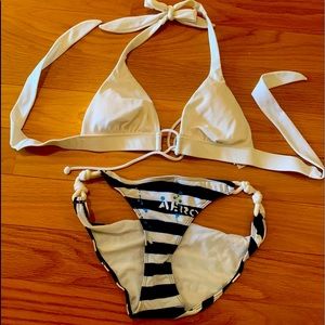 White halter bikini top with striped bottom